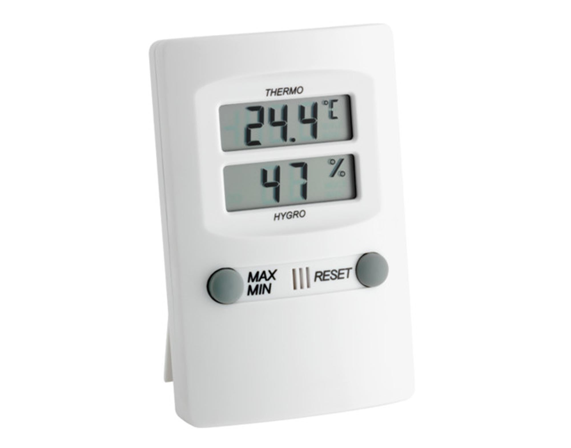 Das TFA Thermo-Hygrometer Maxima Minima in Weiß misst präzise Temperatur und Luftfeuchtigkeit, speichert Maxima und Minima für ein gesundes Raumklima.