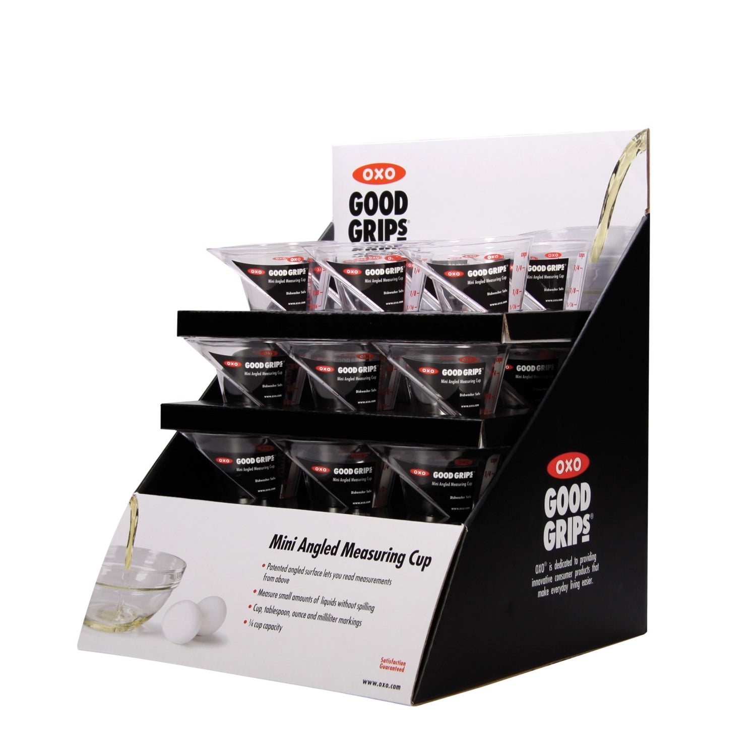 Kompakter, schräg gestalteter Messbecher von OXO mit 60 ml Volumen, ideal für präzise Messungen in der Küche.
