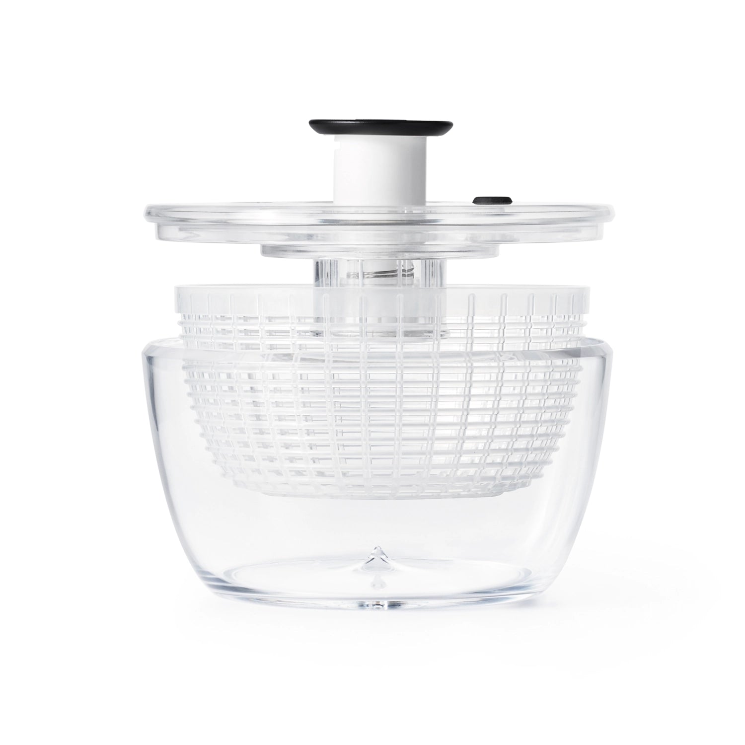 Kompakte, transparente Salatschleuder von OXO mit 2,7 l Volumen, perfekt für frische Salate, einfach zu bedienen und ideal für kleine Küchen.