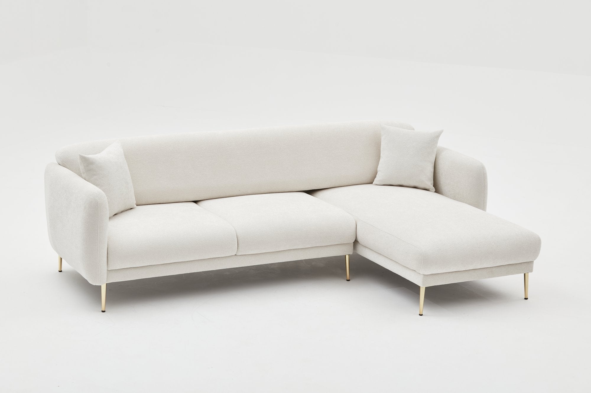 Elegantes Bettsofa Simena in sanften Creme- und Goldtönen, ideal für stilvolle Wohnräume und als komfortable Schlafgelegenheit.