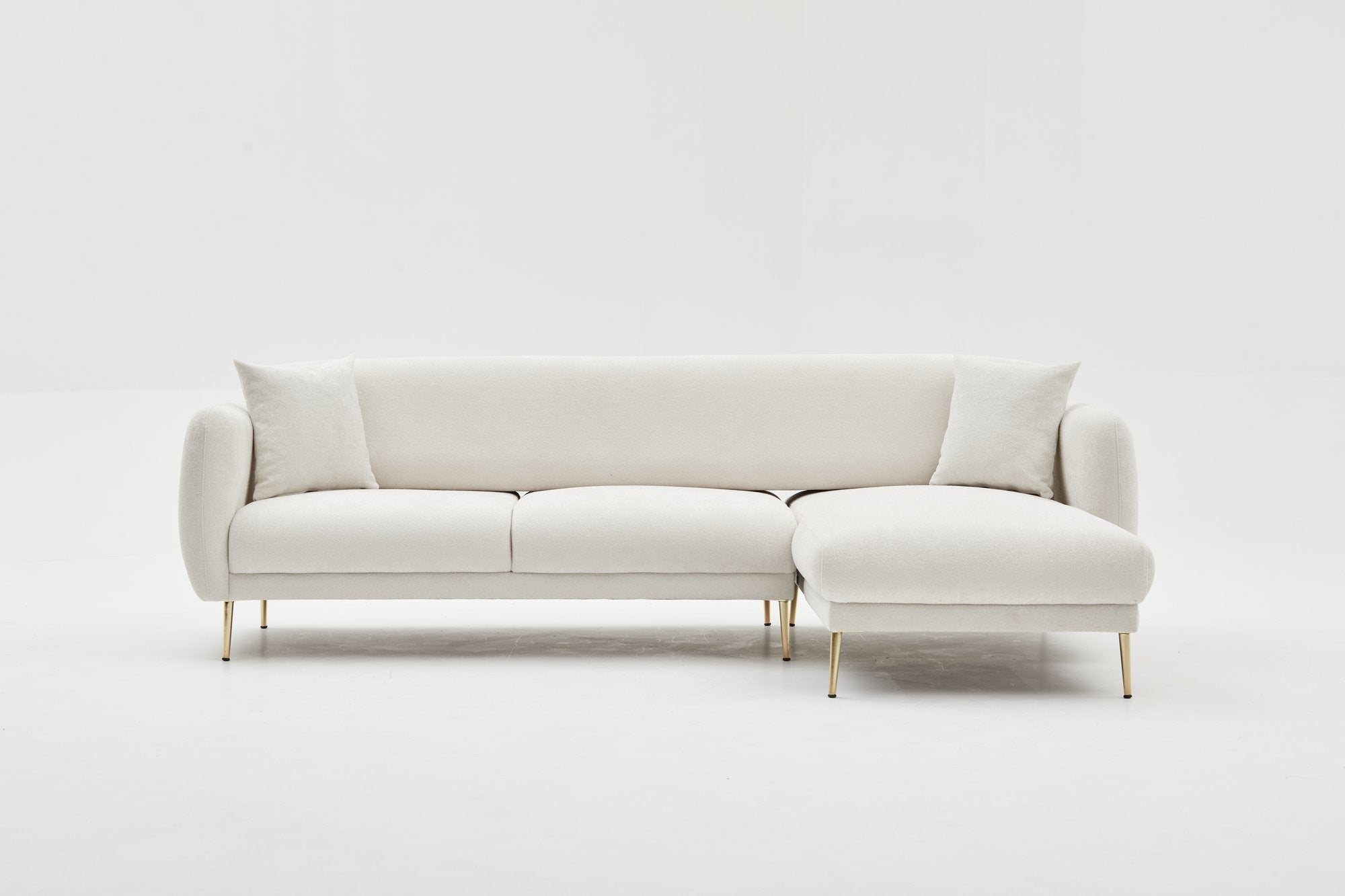 Stilvolles Simena Bettsofa in Creme und Gold, perfekt für moderne Wohnräume und entspannte Stunden. Rechtsseitige Ausführung.