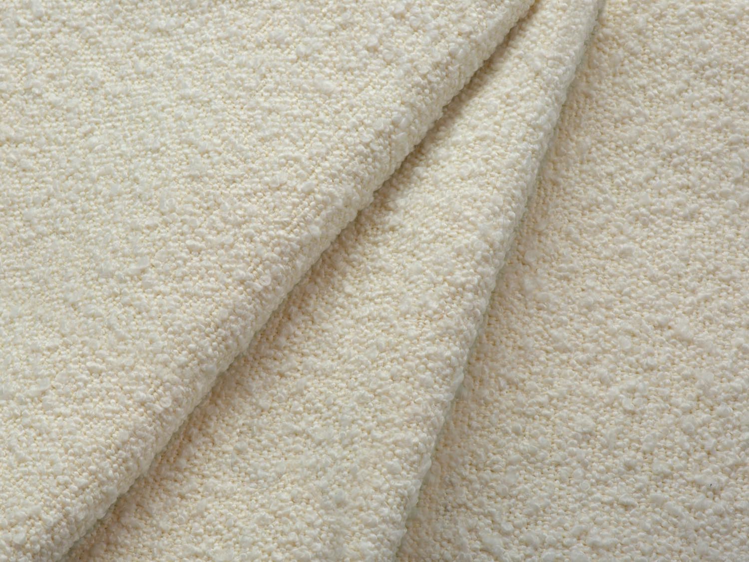 Bequemer Boucle-Sessel in sanften Beige- und Schwarztönen, 94 cm, perfekt für zeitgemäße Inneneinrichtungen und geschmackvolle Akzente.
