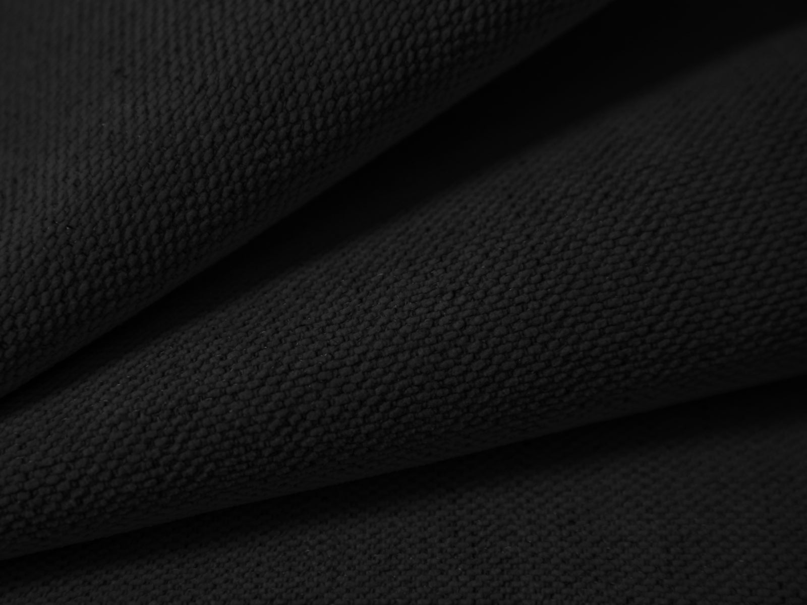 Eleganter 1-Sitzer Pouf Campi in modernem Schwarz, ideal für stilvolle Wohnräume. Hochwertige Materialien und Verarbeitung von Cosmopolitan Design.