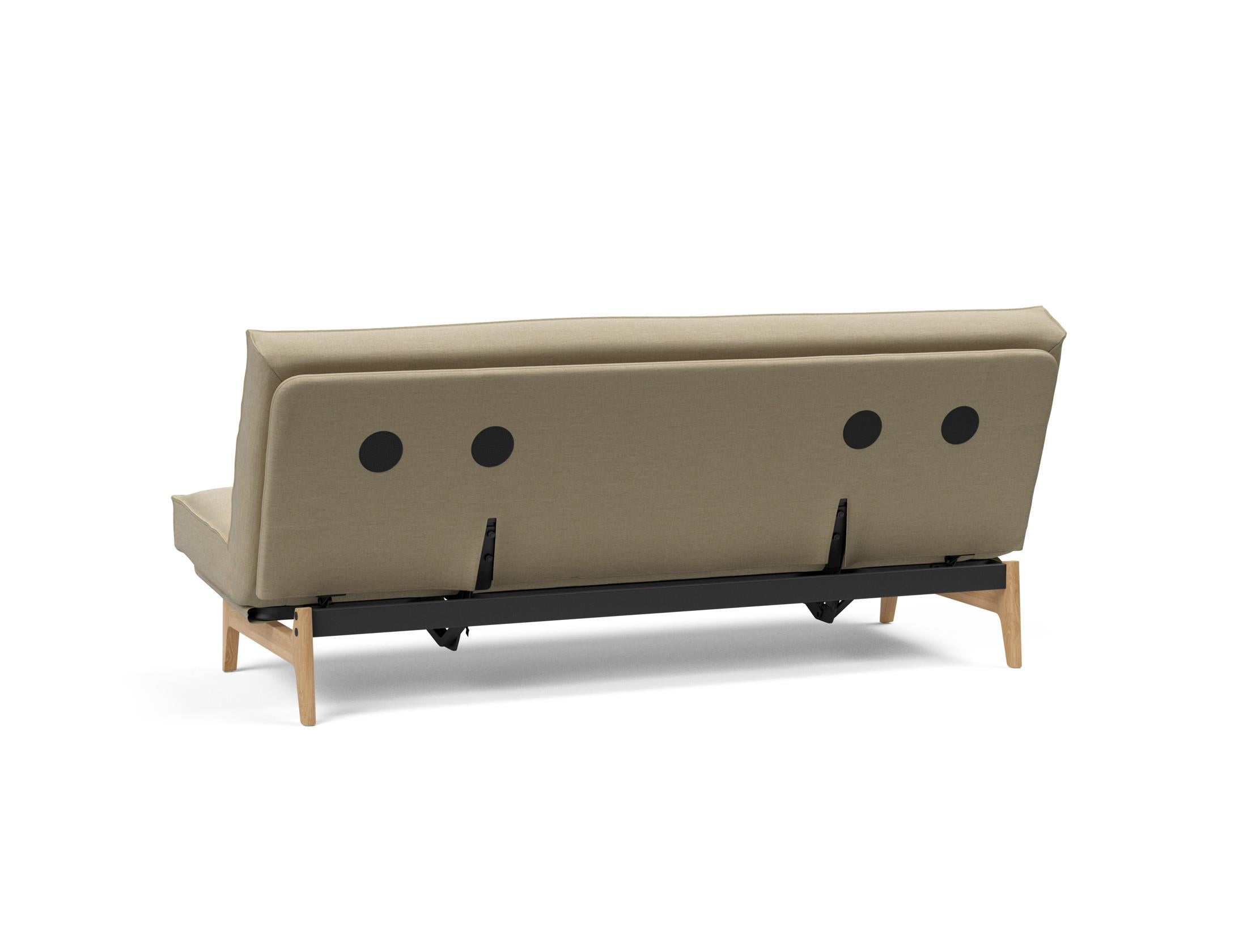 Modernes Aslak 120 Bettsofa mit hochwertigem Soft Spring Bezug, ideal für gemütliche Wohnräume und als praktische Schlaflösung.