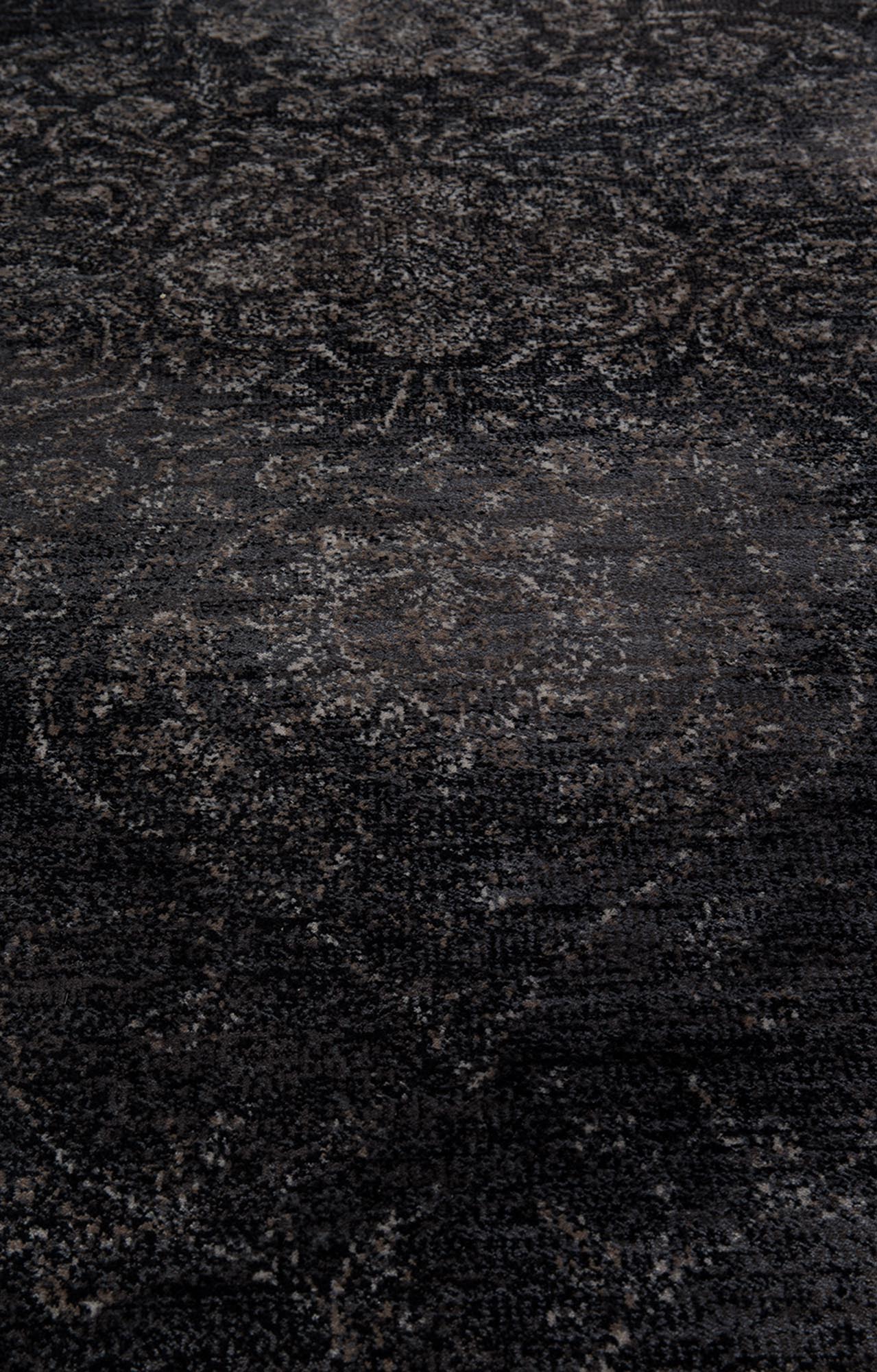 Der Teppich Rugged von Dutchbone besticht durch seine robuste Oberfläche und verleiht jedem Raum eine gemütliche, einladende Atmosphäre.