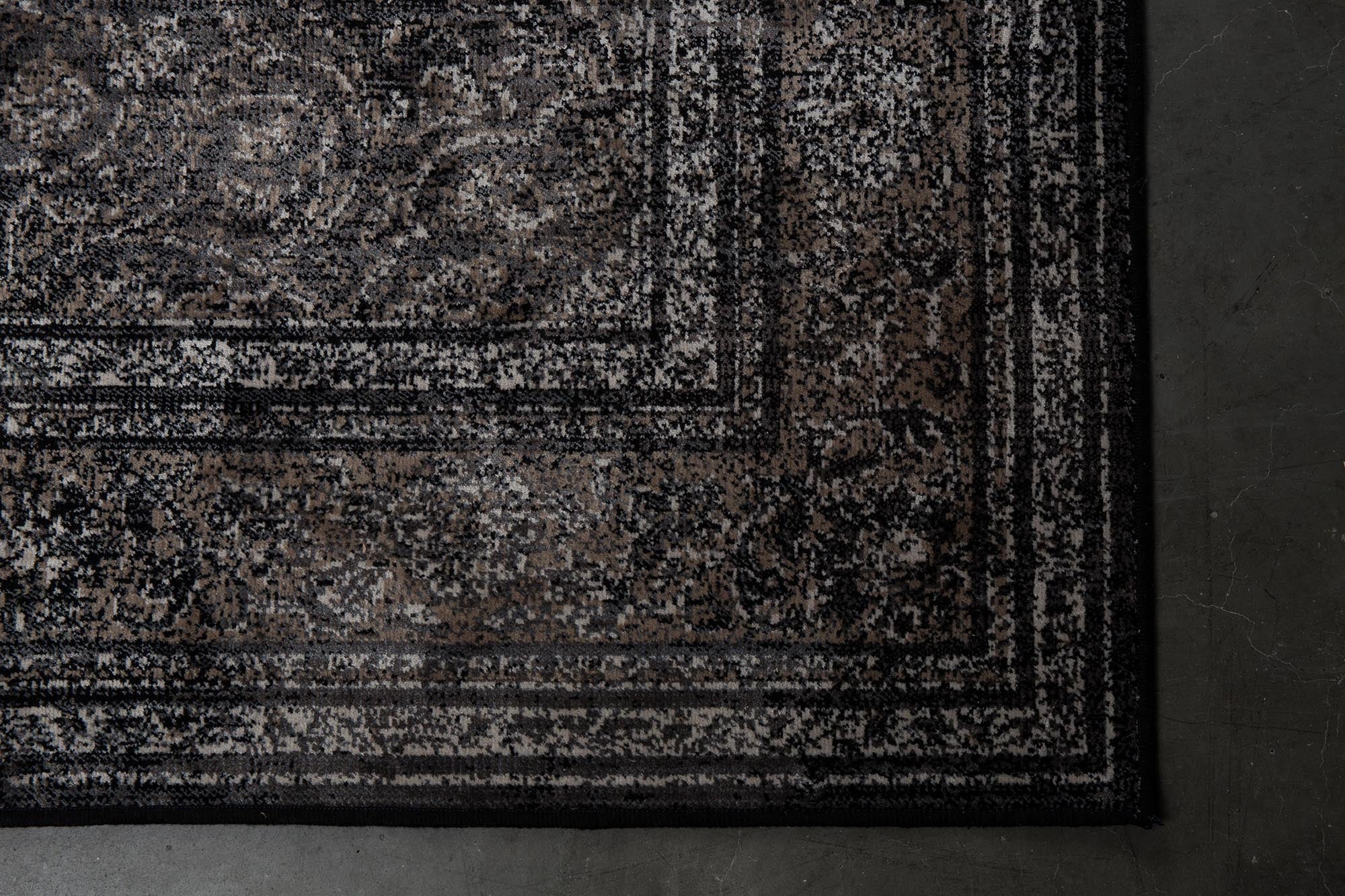 Der Teppich Rugged von Dutchbone zeigt eine einzigartige Textur und erdige Farben, die jedem Raum Charakter und Wärme verleihen.