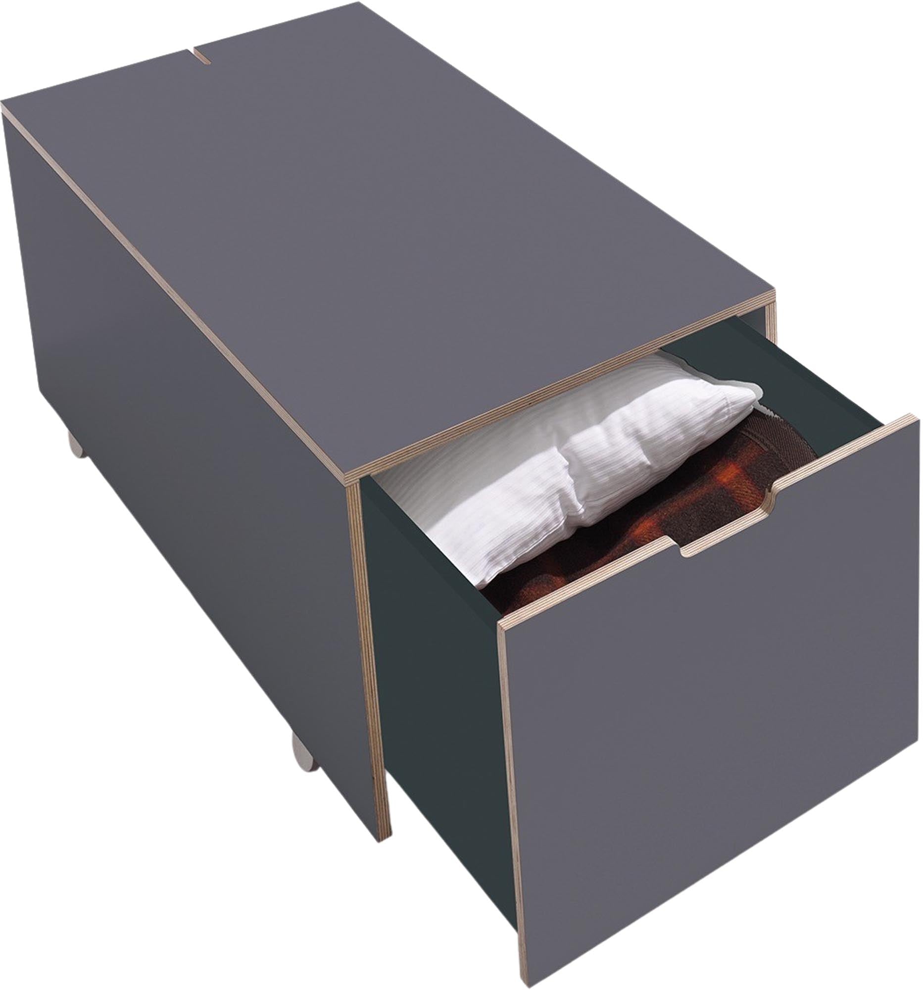 Bettkasten16 von Müller Möbelwerkstätten: Eleganter Stauraum mit integriertem Schubkasten für mehr Ordnung im Schlafzimmer.