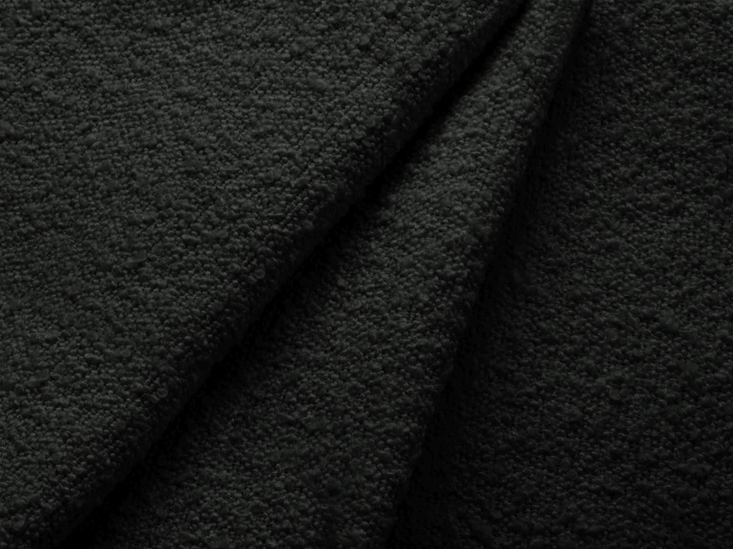 Stylisches Miley Boucle Modul links 1 Sitzer in klassischem Schwarz, perfekt für moderne Wohnräume und kreative Raumgestaltungen.