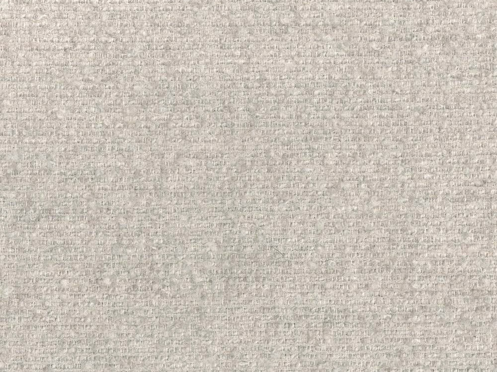 Stylischer 1-Sitzer Pouf Martina in zartem Beige, perfekt für gemütliche Akzente und modernes Wohndesign.