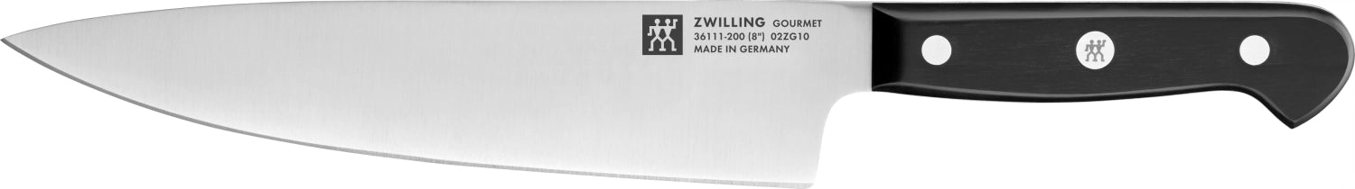 Eleganter ZWILLING Gourmet Messerblock aus natürlichem Holz, 7-teilig, perfekt für die stilvolle und sichere Aufbewahrung Ihrer Küchenutensilien.
