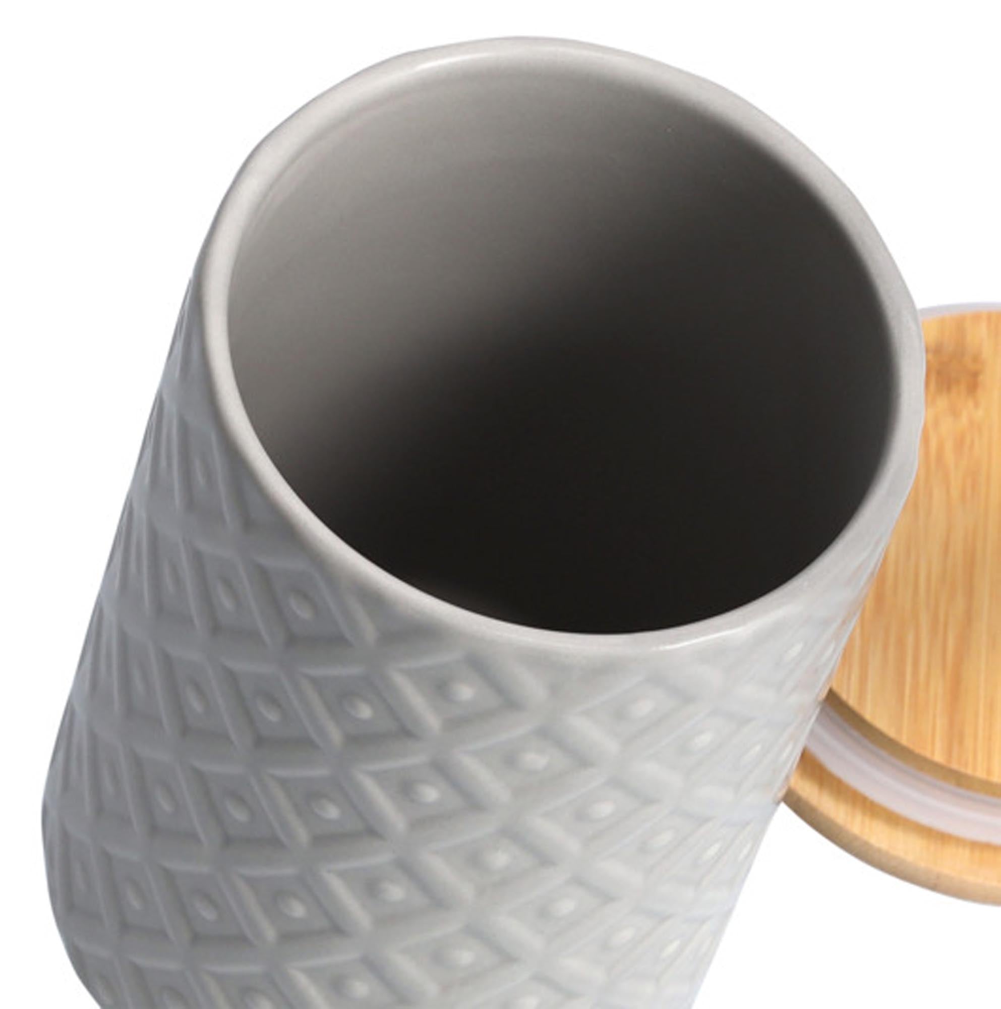 Elegante ZELLER PRESENT Vorratsdose aus grauem Steingut mit einem natürlichen Bambusdeckel, perfekt für die praktische und dekorative Lagerung.