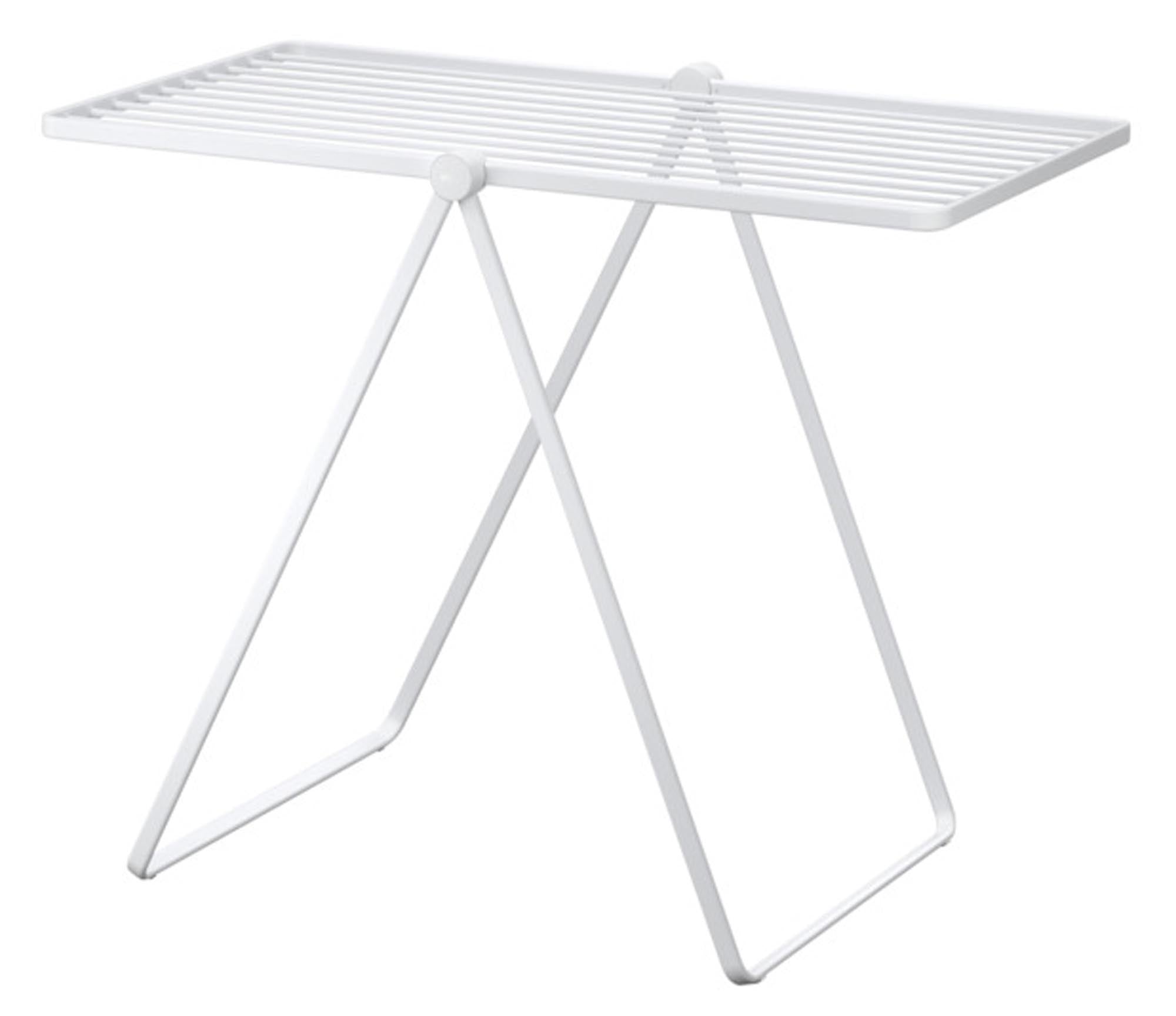 Offset Bettüberwurf von Ferm Living in sanften Farben, ideal für eine stilvolle Schlafzimmergestaltung.