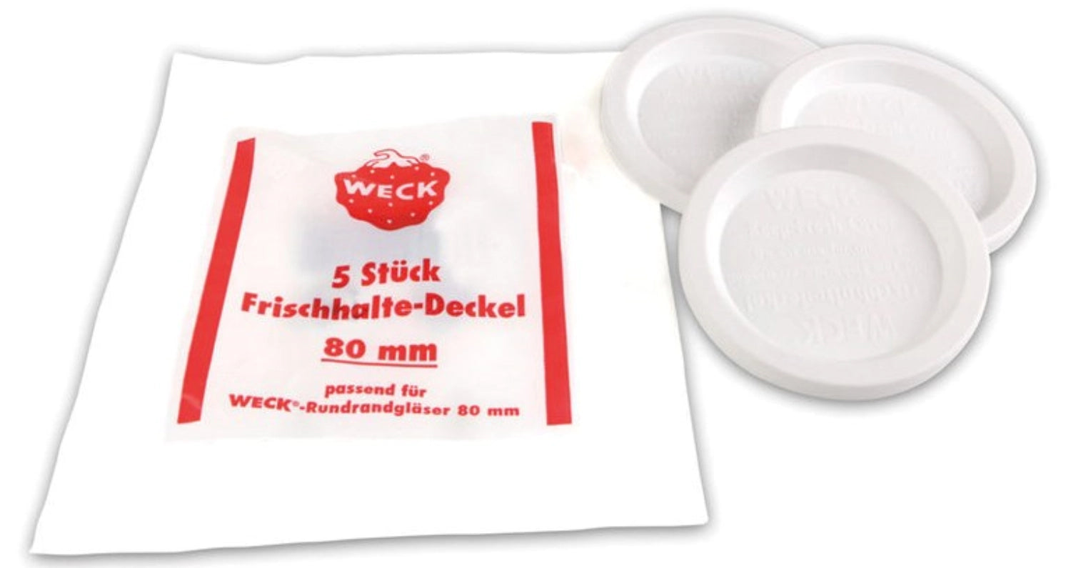 Fünf praktische Frischhalte-Deckel von Weck, ideal zum luftdichten Verschließen von Schalen und Töpfen, um Lebensmittel frisch zu halten.