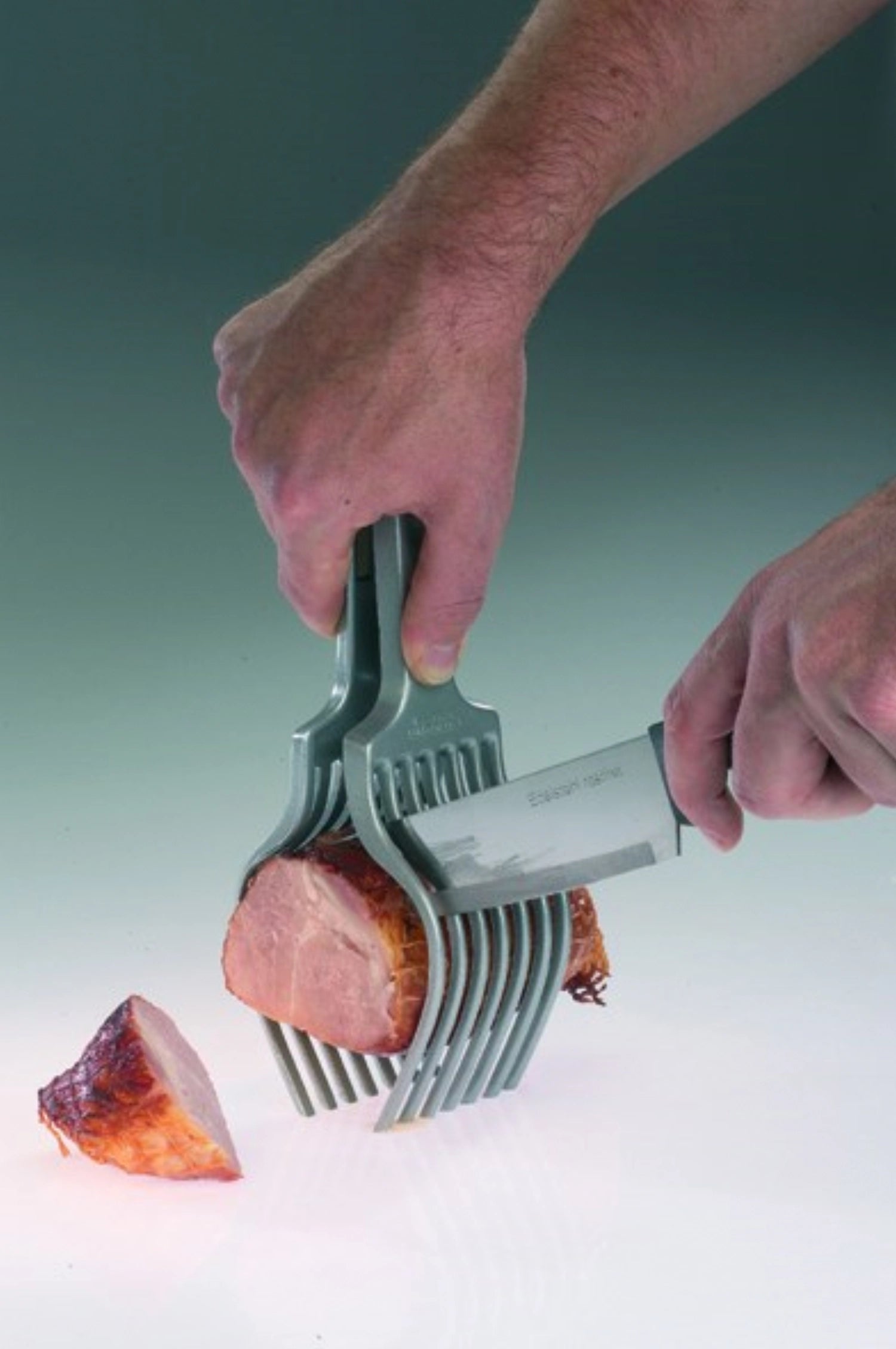 Praktische Tranchierhilfe Tranchetta von Westmark, 25.5x7.5x6.5cm, ideal zum sicheren Schneiden und Servieren von Fleisch und Gemüse.