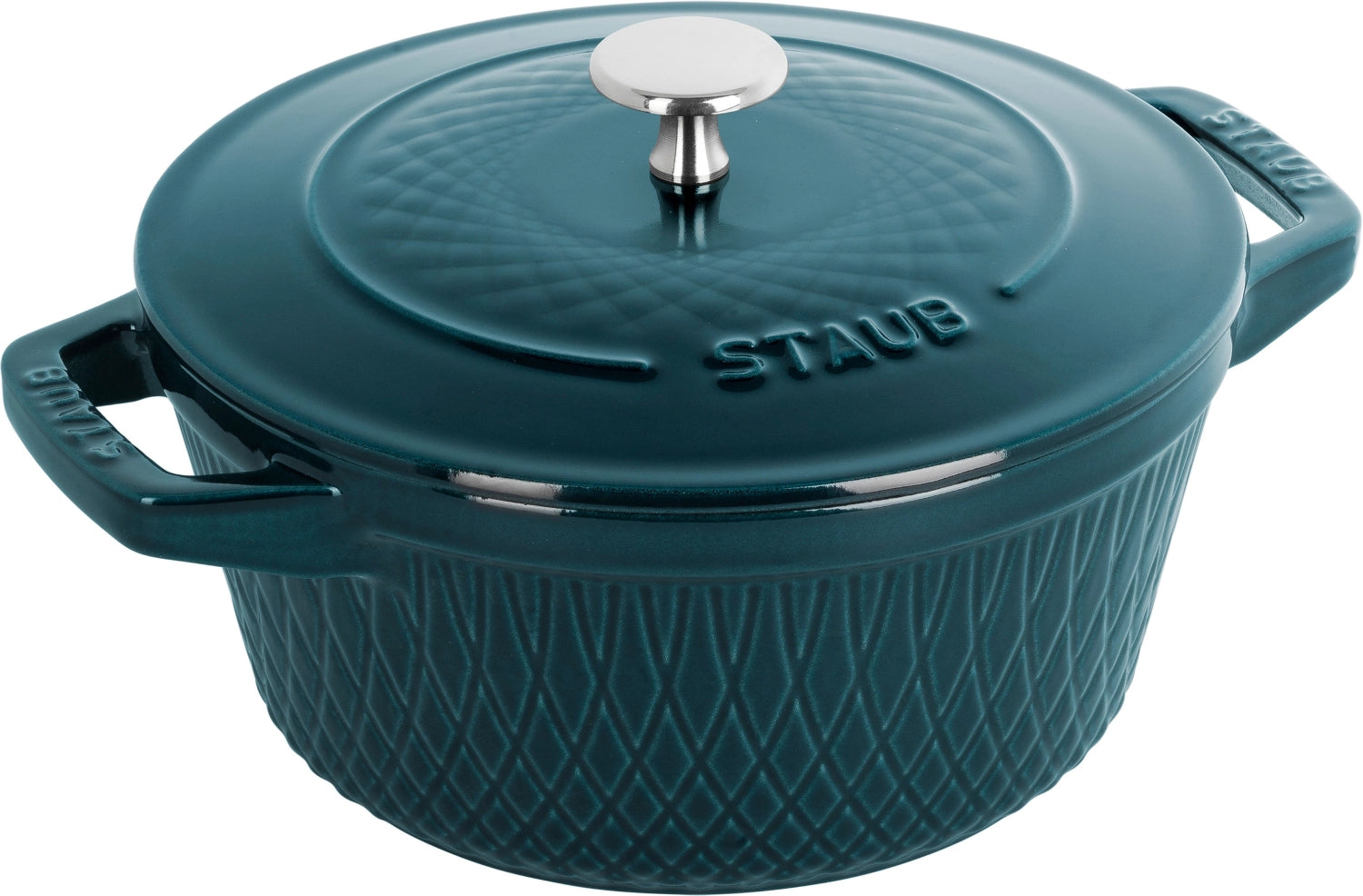 Runde 3,8 l Cocotte von Staub mit gedrehtem Design, ideal für kreative Kochabenteuer und ansprechende Tischpräsentationen.