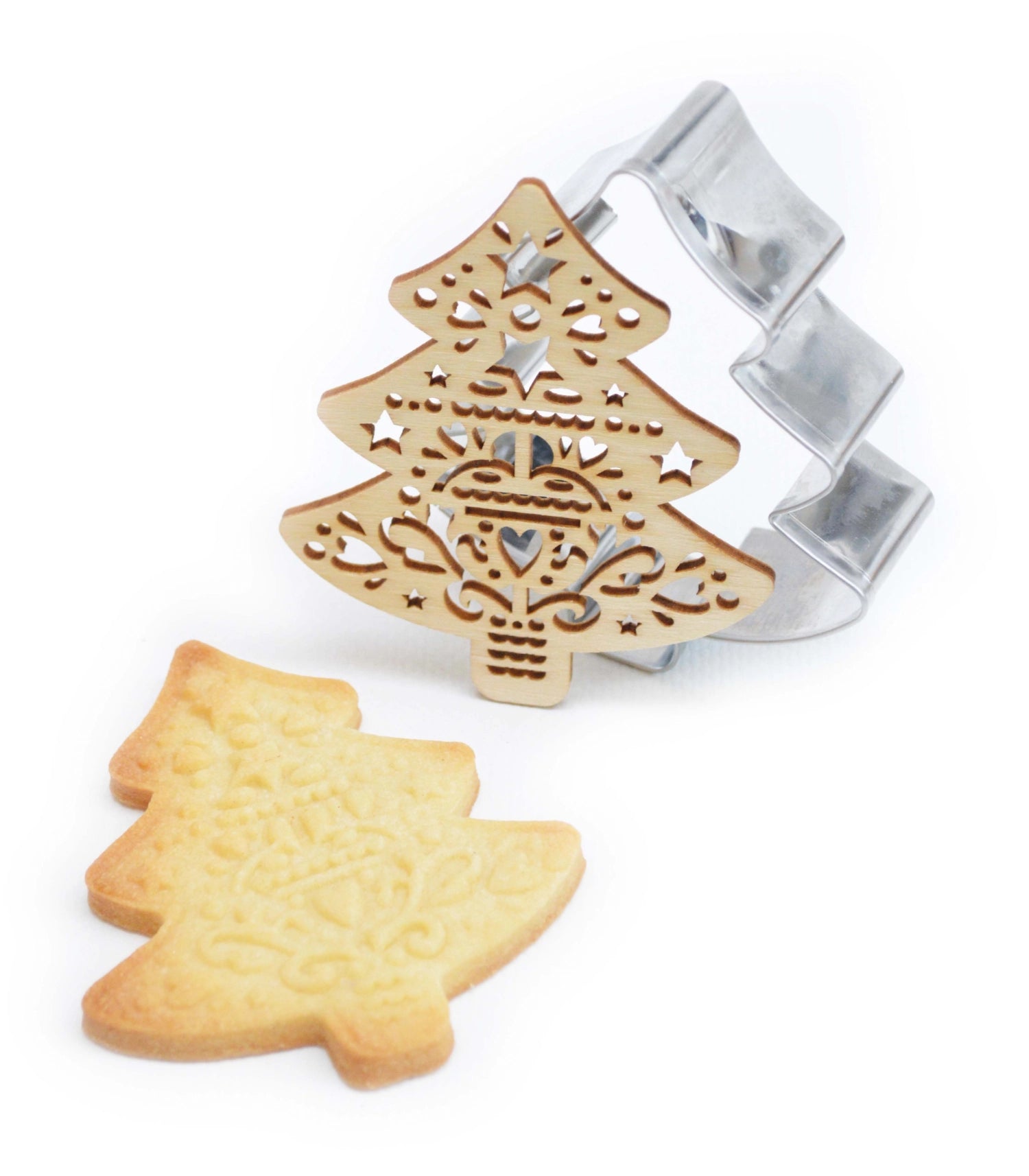 Ausstechform und Holzpräger in Tannenbaum-Design von Scrap Cooking, ideal für weihnachtliche Plätzchen und kreative Backideen.