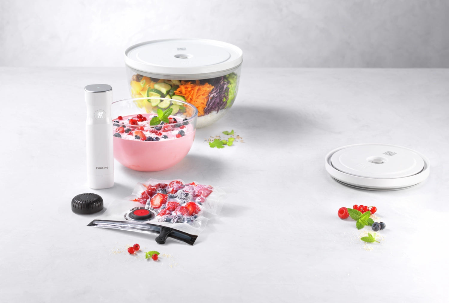Vakuum Starter Set von Zwilling mit 9 Glasbehältern, perfekt für die schonende Lagerung und Frischhaltung von Lebensmitteln.