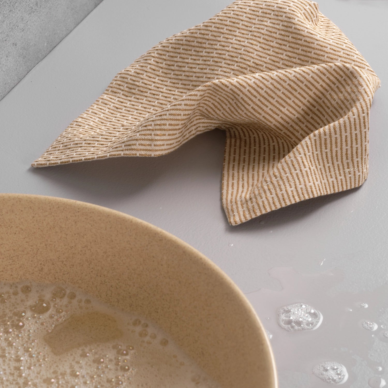 Spültuch 30x35 cm in stone khaki aus Biobaumwolle von The Organic Company, umweltfreundlich und nachhaltig, perfekt für die Küche.