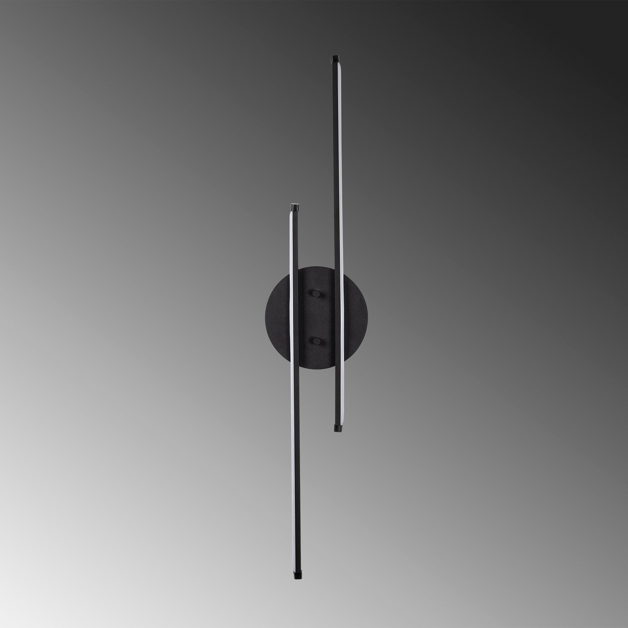 Die Umut Wandleuchte von Opviq in stilvollem Schwarz kombiniert modernes Design mit warmer Beleuchtung und verleiht jedem Raum eine elegante Atmosphäre.
