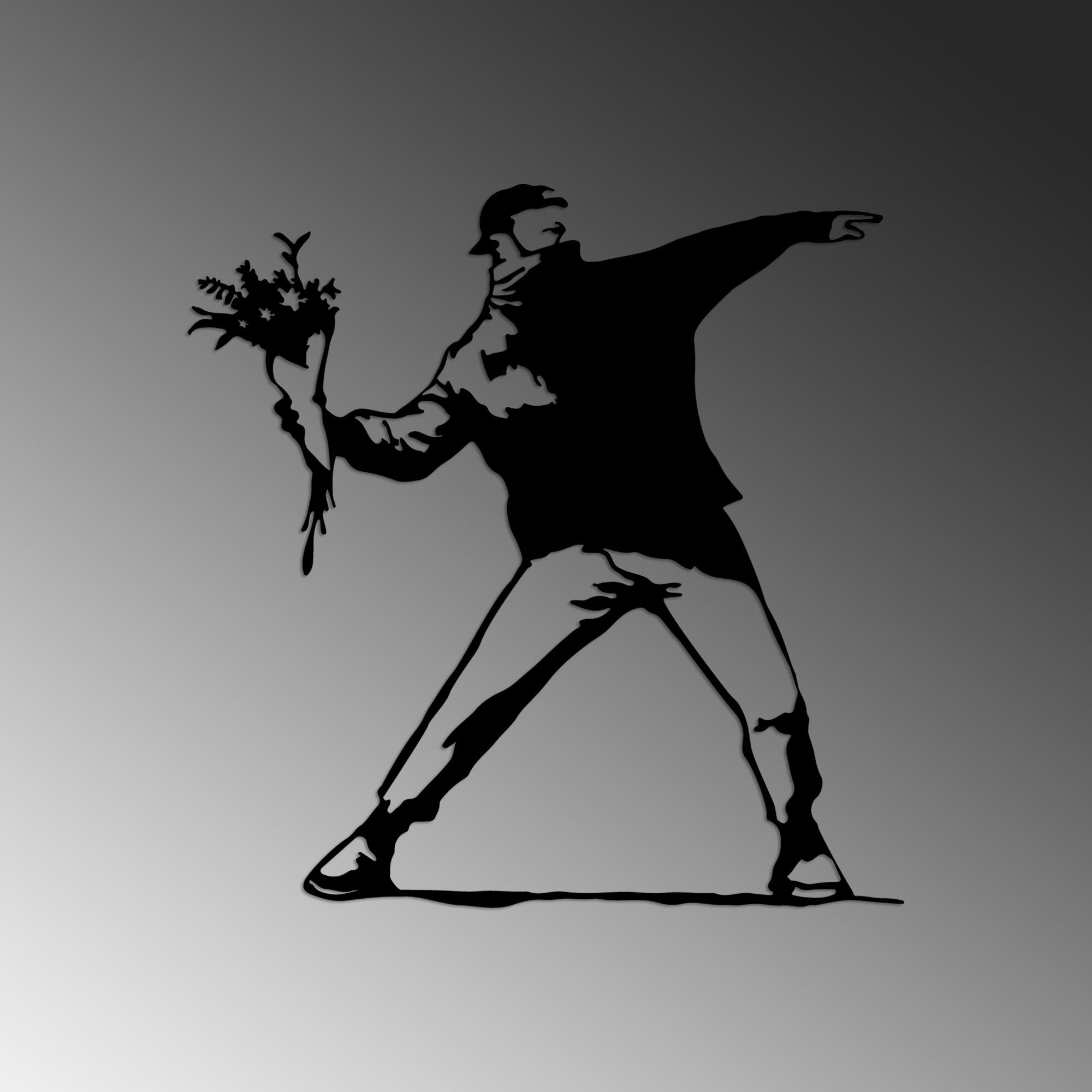 Verwandeln Sie Ihre Wände mit der Banksy Metal 01 Wanddeko von Wallity. Dieses schwarze Metallkunstwerk vereint Stil und Langlebigkeit.