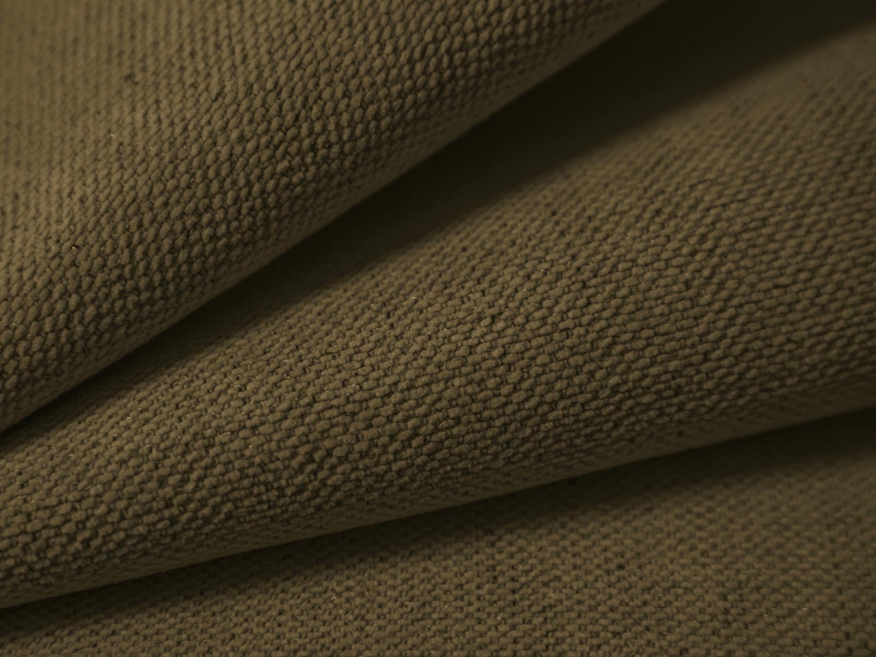 Stylisches, modulares 3-Sitzer Ecksofa Campi in elegantem Grün, ideal für stilvolle Wohnräume und entspannende Auszeiten.