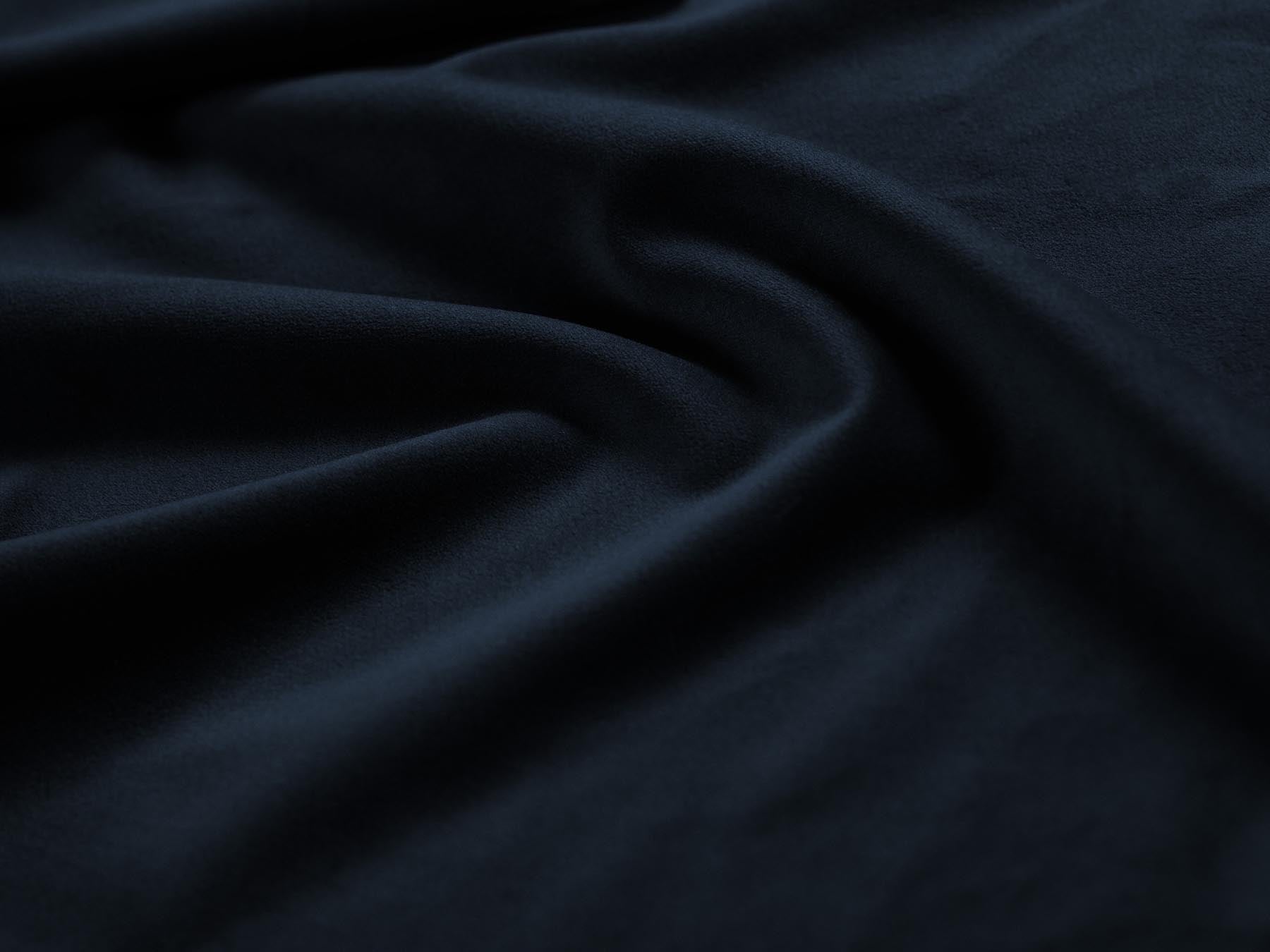 Eleganter 1-Sitzer Pouf Hawaii in tiefem Navy Blue, aus luxuriösem Magic Velvet, ideal für stilvolle und gemütliche Wohnräume.