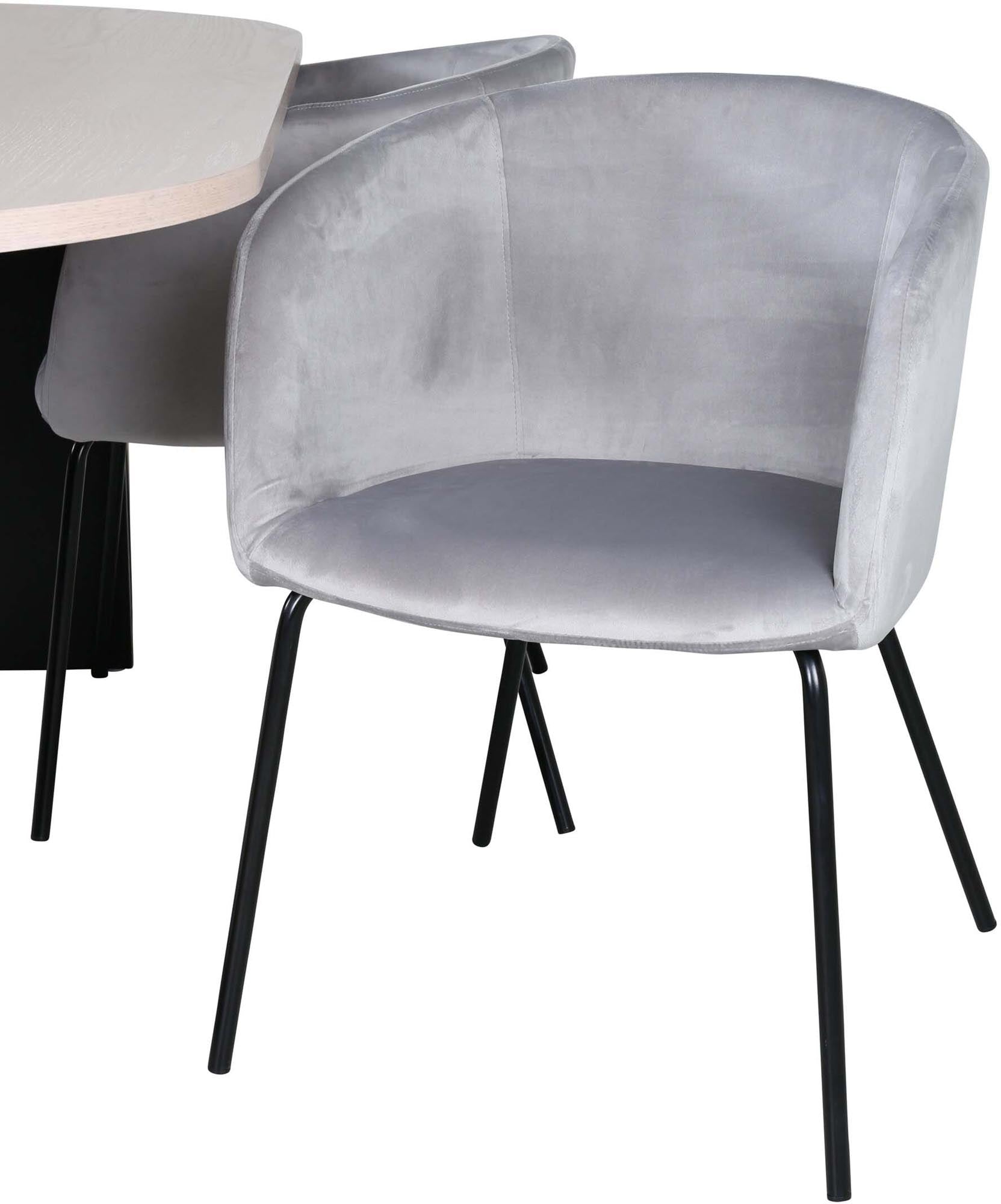 Modernes Esszimmerset Bianca mit ovalem Tisch und vier eleganten Samtstühlen, ideal für stilvolle Essbereiche und gesellige Abende.