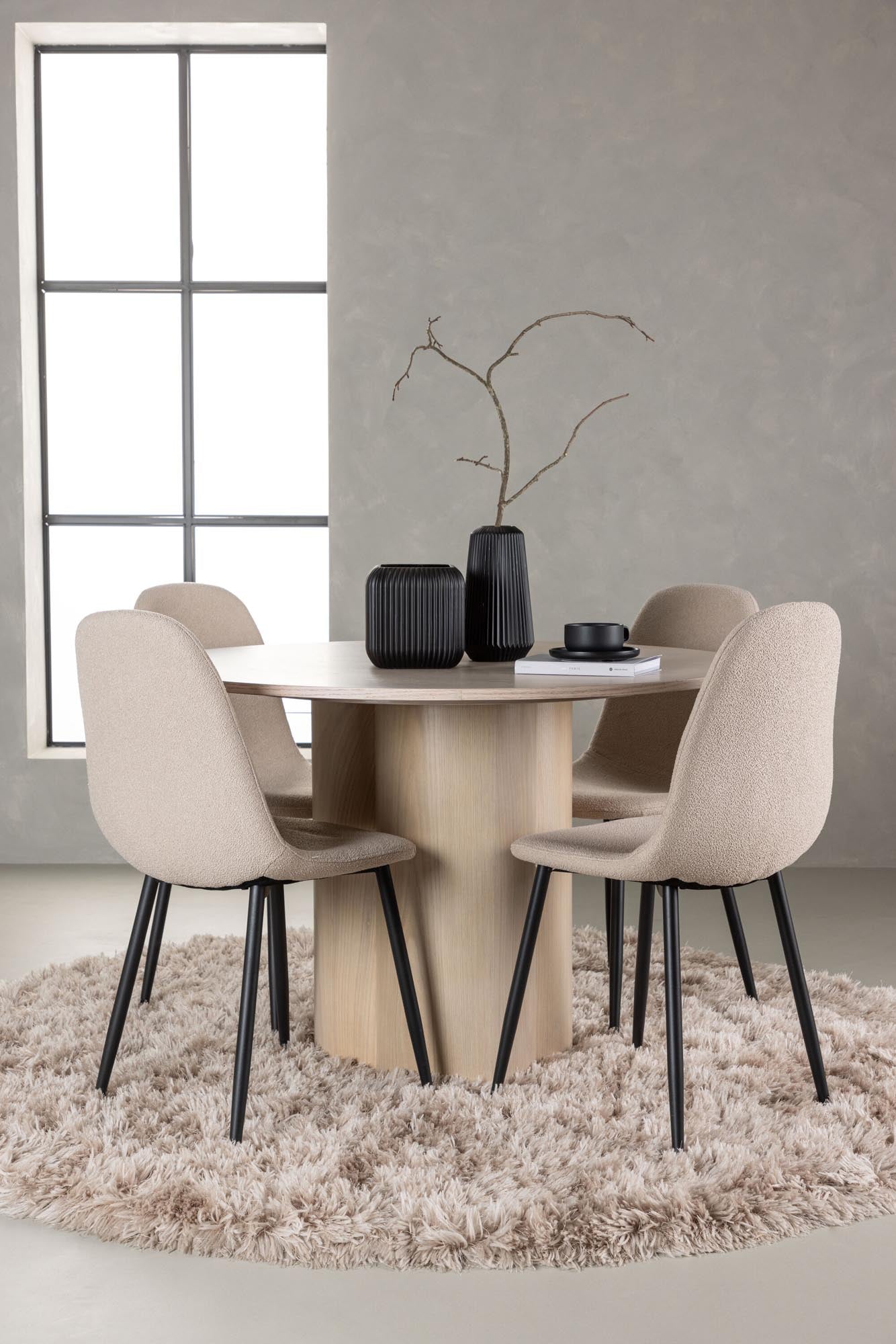 Elegantes Esszimmerset Olivia mit runder Tischplatte und vier bequemen Stühlen, ideal für gemütliche Mahlzeiten und modernes Wohnen.