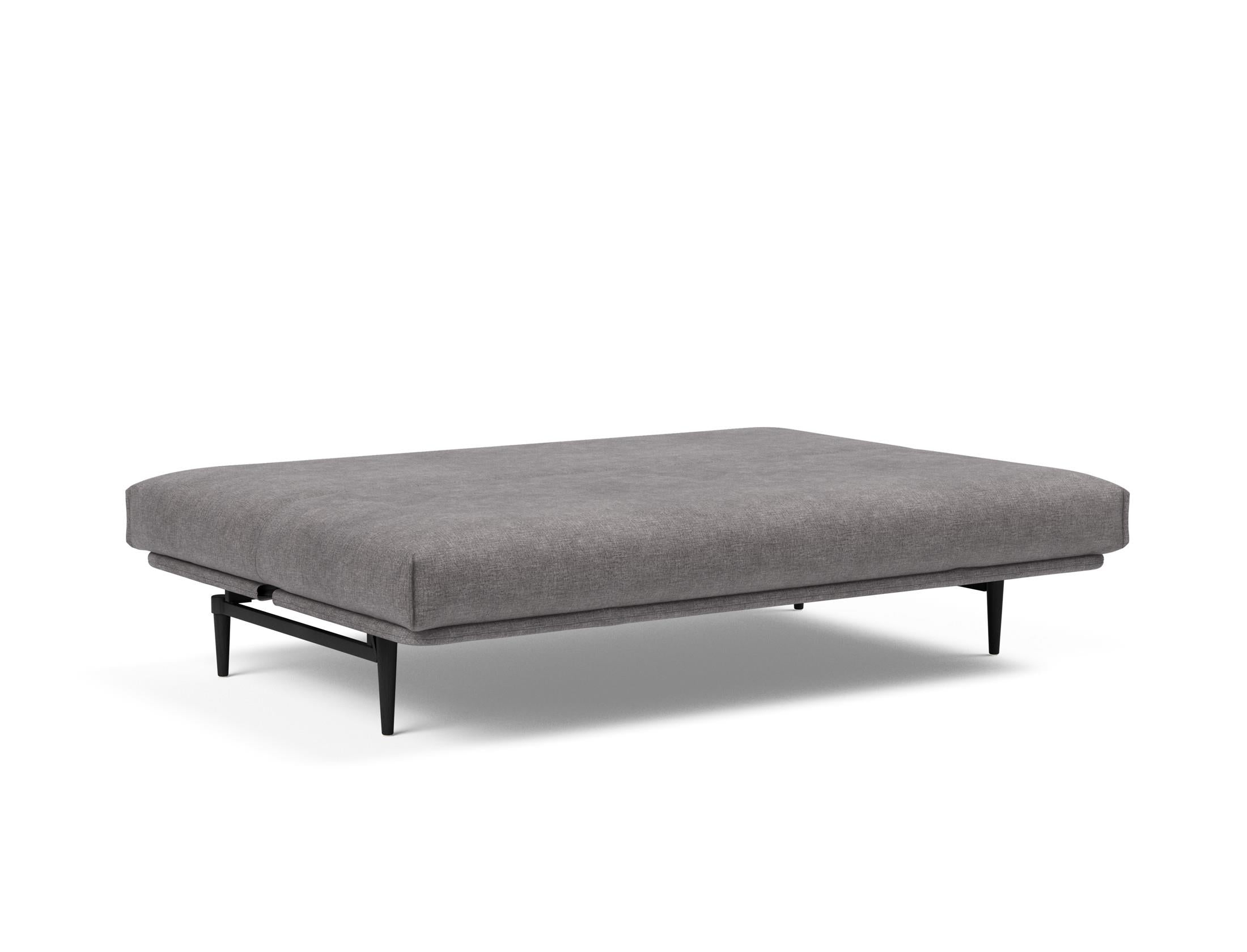 Elegantes Colpus Bettsofa in schwarzer Eiche, ausgestattet mit einem weichen Soft Spring Bezug, perfekt für stilvolle Wohnräume.