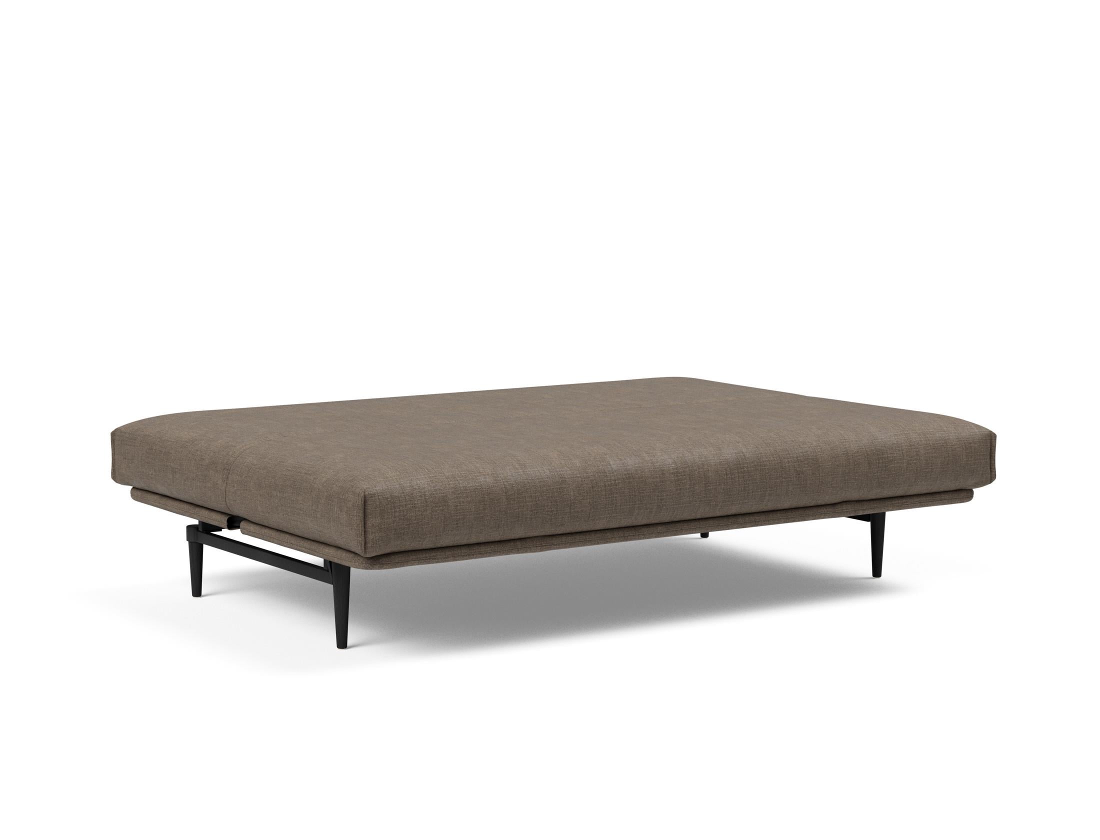 Elegantes Colpus Bettsofa in schwarzer Eiche, ausgestattet mit einem weichen Soft Spring Bezug, perfekt für gemütliche und moderne Wohnumgebungen.