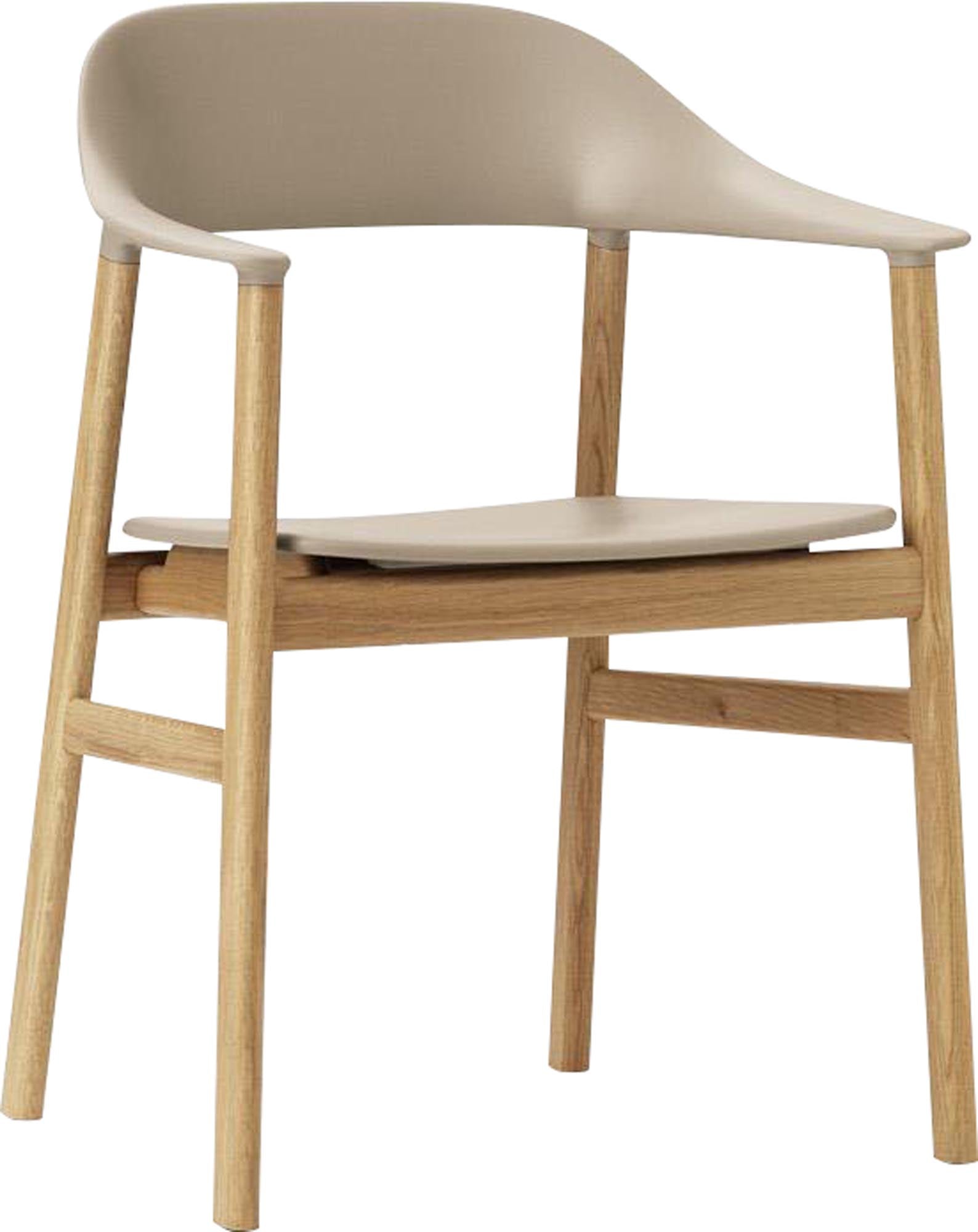 Stylischer Herit Armlehnstuhl von Normann Copenhagen, der Komfort und zeitgemäßes skandinavisches Design harmonisch verbindet.