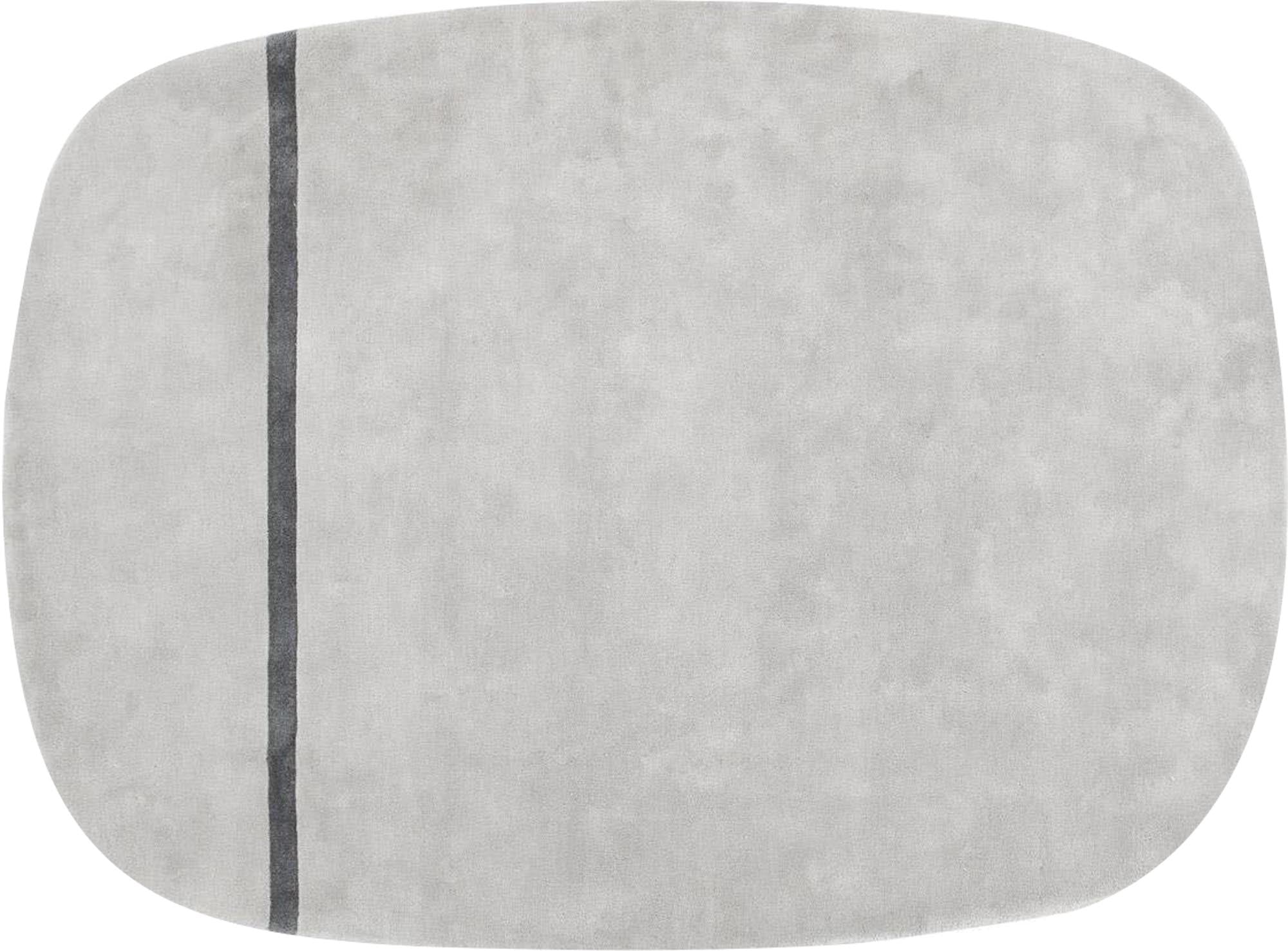 Oona Teppich von Normann Copenhagen: Stilvoller Teppich mit sanften Farbtönen und zeitgemäßen Mustern, ideal für jedes Wohnambiente.