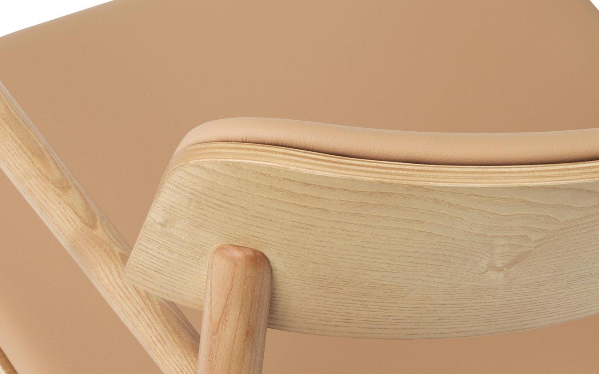 Eleganter Timb Sessel von Normann Copenhagen mit stilvollen Armlehnen, ideal für modernes Wohndesign und Komfort.