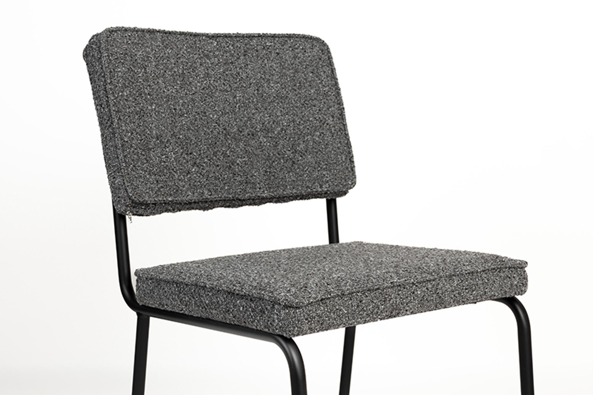Eleganter Zuiver Buddy Stuhl mit minimalistischer Formgebung, perfekt für zeitgemäße Wohnräume und vielseitige Nutzung.