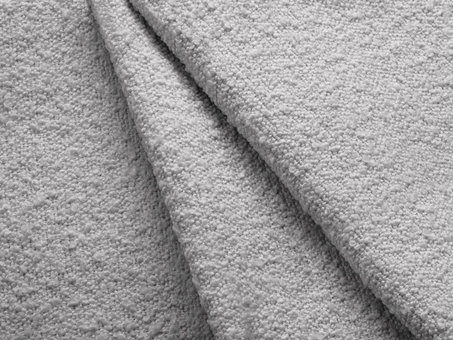 Stylischer 1-Sitzer Miley Boucle Modul rechts in sanftem Grau, perfekt für kreative und anpassbare Sofalösungen von Micadoni.