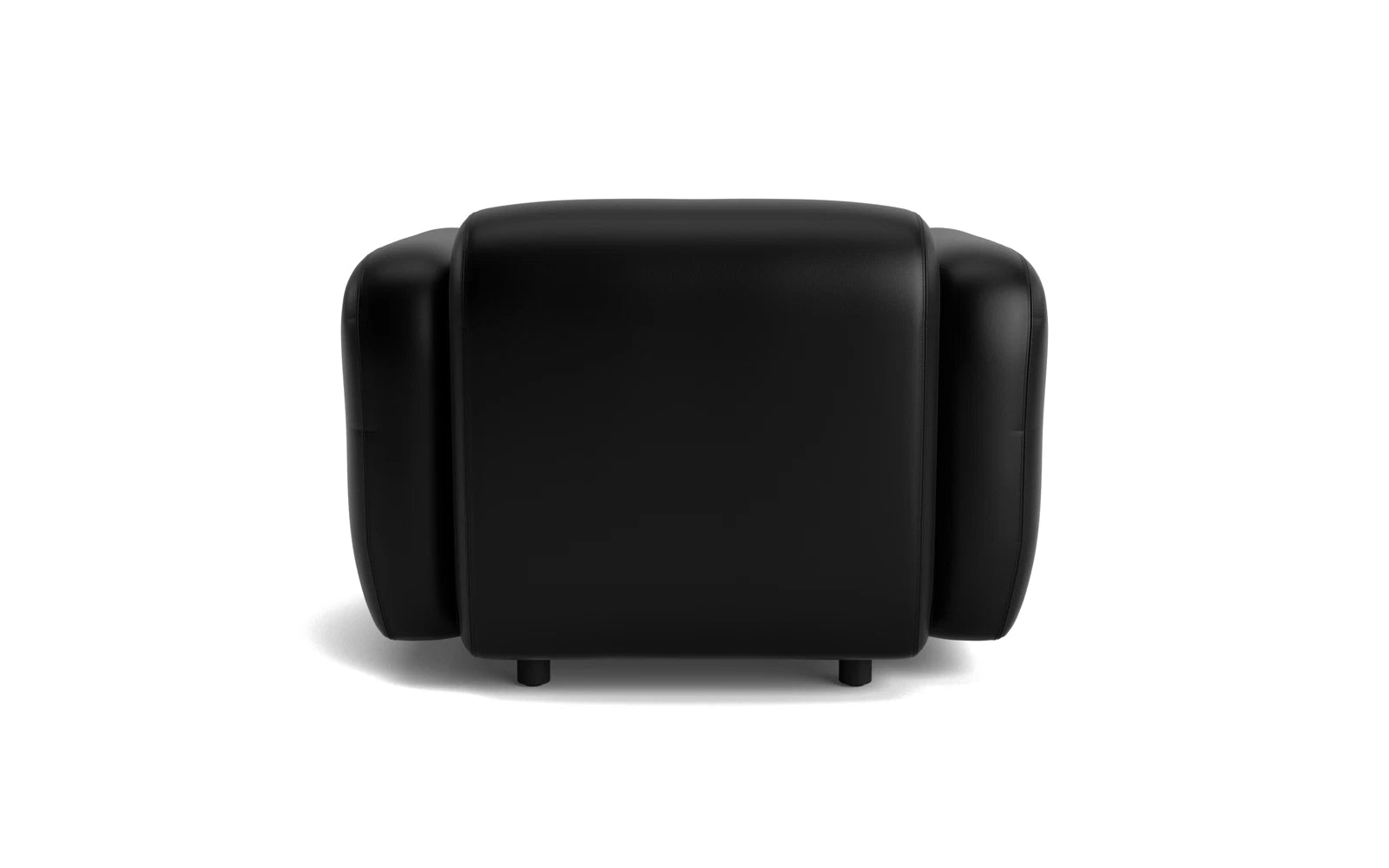 Der Swell Sessel von Normann Copenhagen kombiniert modernes Design mit bequemen Armlehnen und lädt zum Entspannen ein.