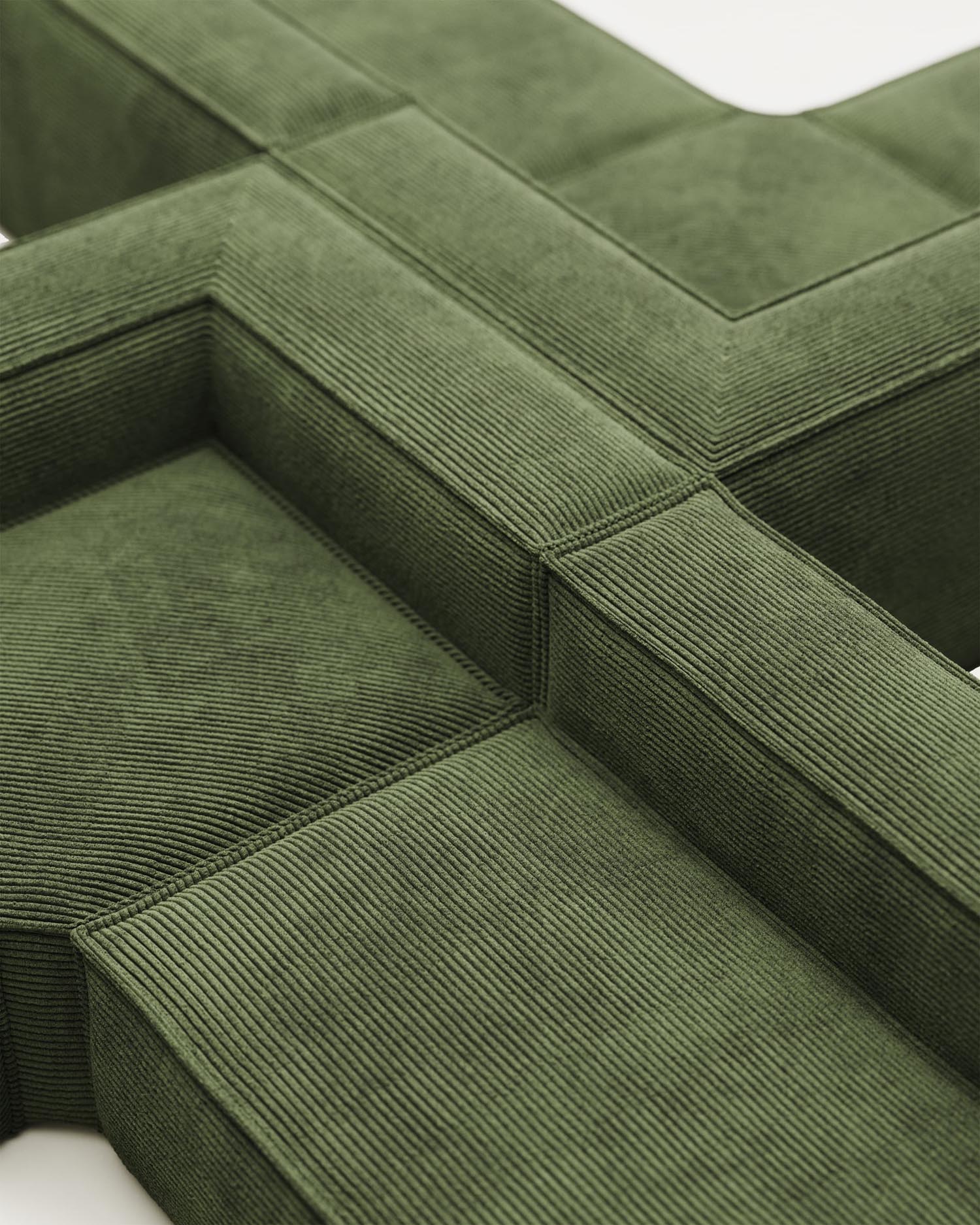 Das stilvolle Blok Ecksofa in grünem Cord vereint Komfort und Design. Mit 320 x 320 cm bietet es Platz für gesellige Stunden und ist umweltfreundlich.